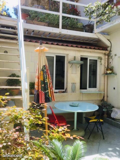 Appartement Les Volets Bleus T3 de 80 m2 patio privatif à Rochefort-sur-Mer Extérieur photo